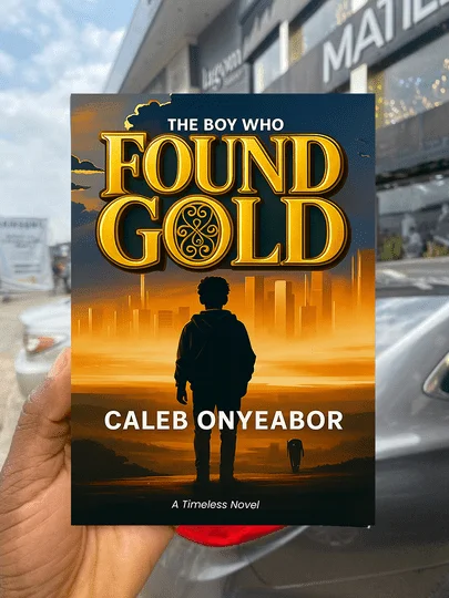 Reader holding The Boy Who Found Gold novel by Caleb Onyeabor Accra, Ghana - African literature and inspirational fiction